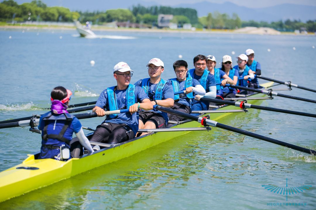 An octuple scull on the river